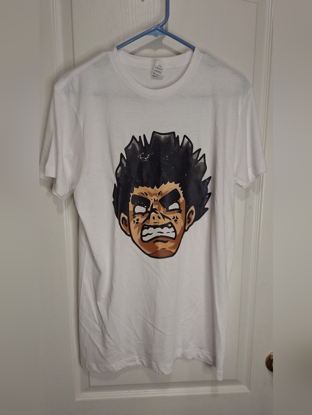 White Short-Sleeve Graphic Tee with Bold Anime Face / Medium